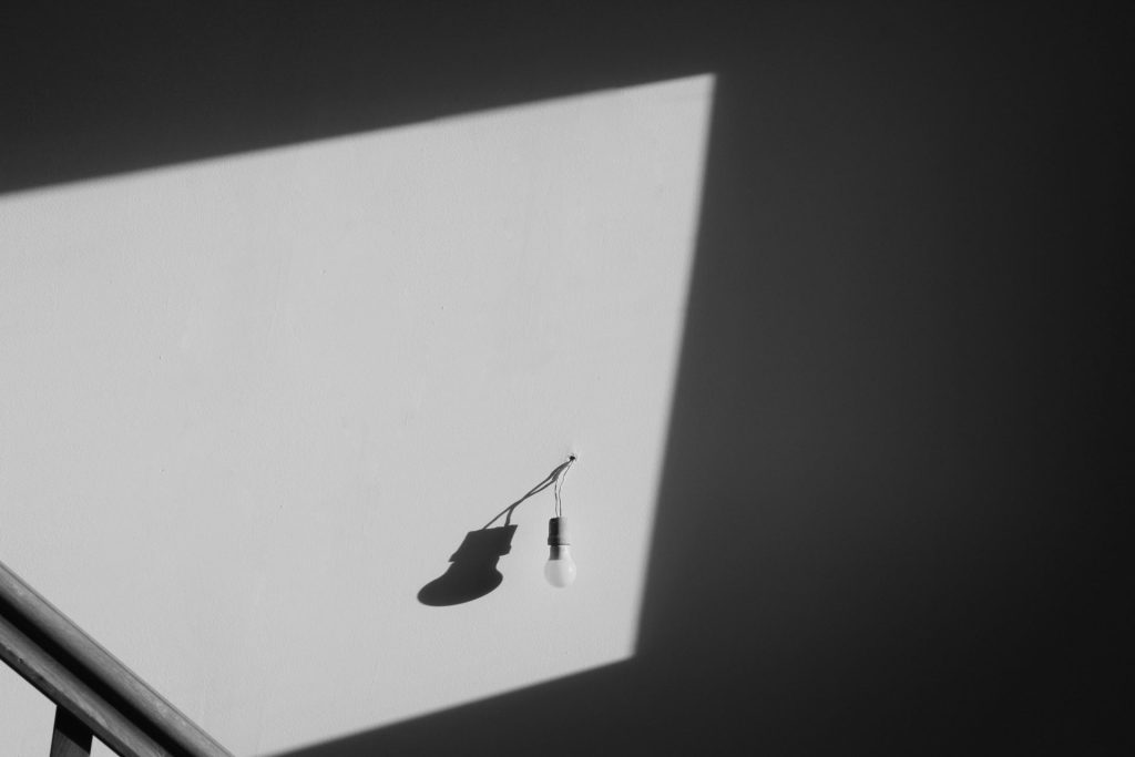 black pendant lamp on white ceiling